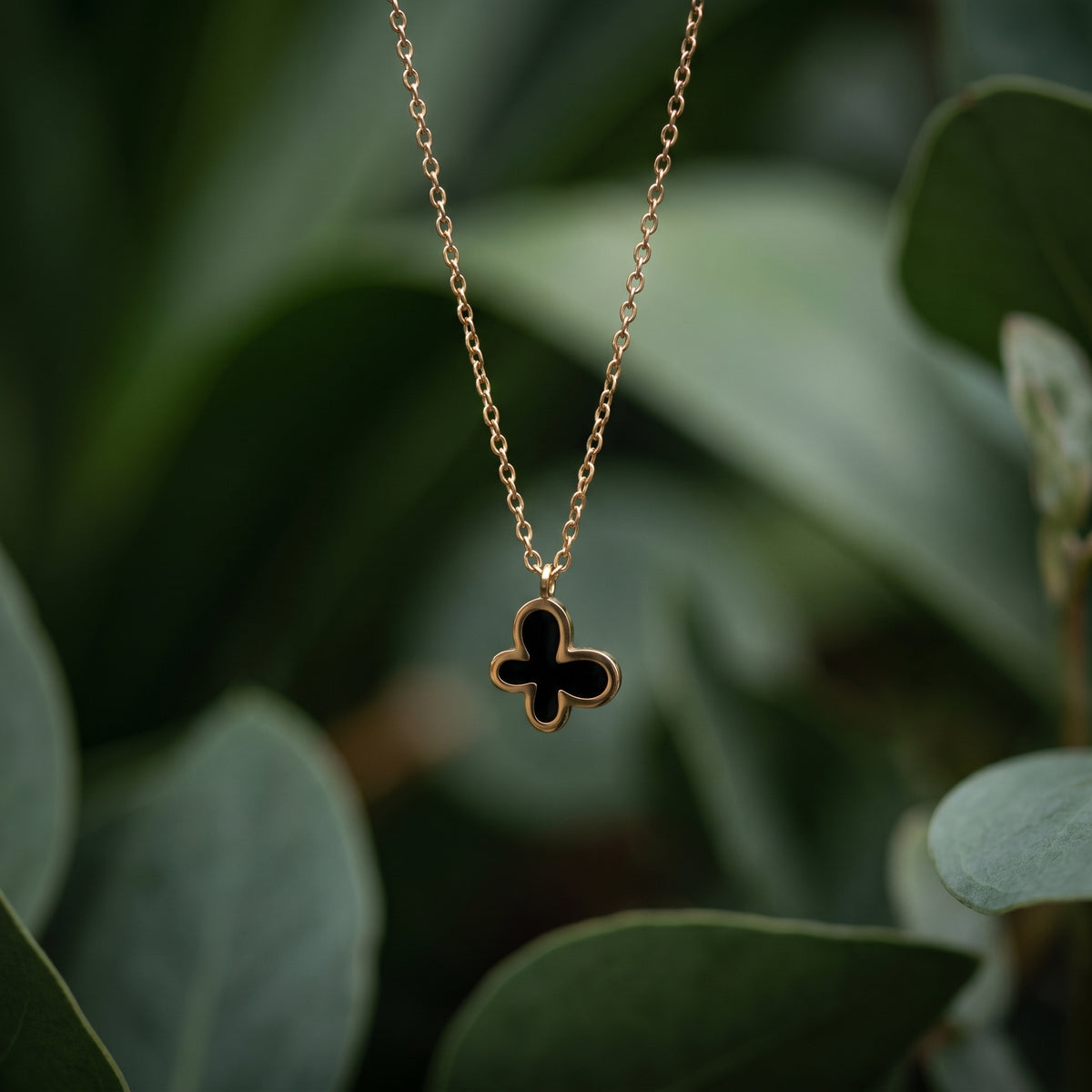 Abstract Black Quatrefoil Pendant Necklace