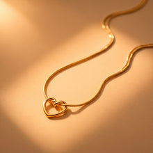 Elegant Gold-Plated Open Heart Knot Pendant on Snake Chain