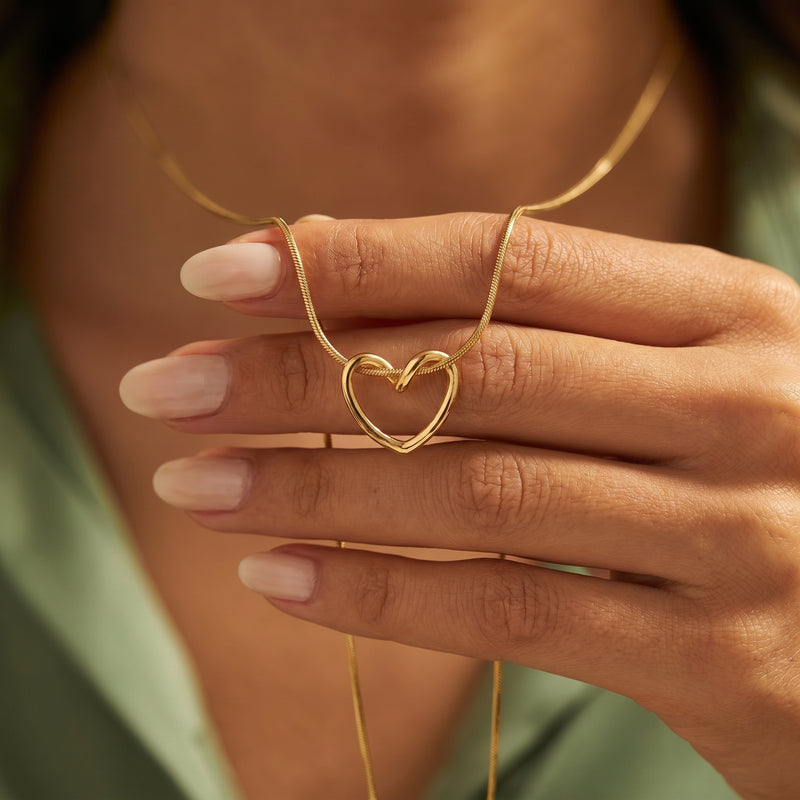 Elegant Gold-Plated Open Heart Knot Pendant on Snake Chain